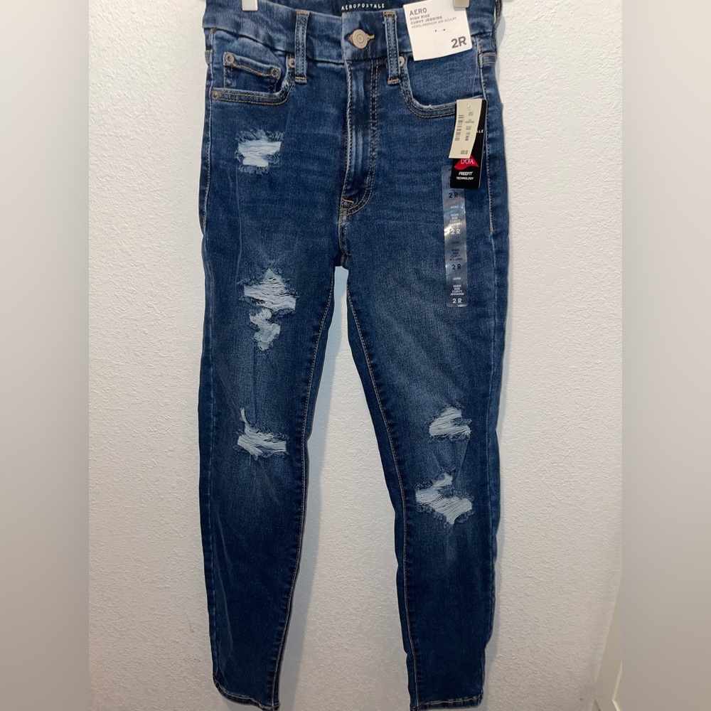 Blue Skinny Distressed Jeans with Tapered Leg